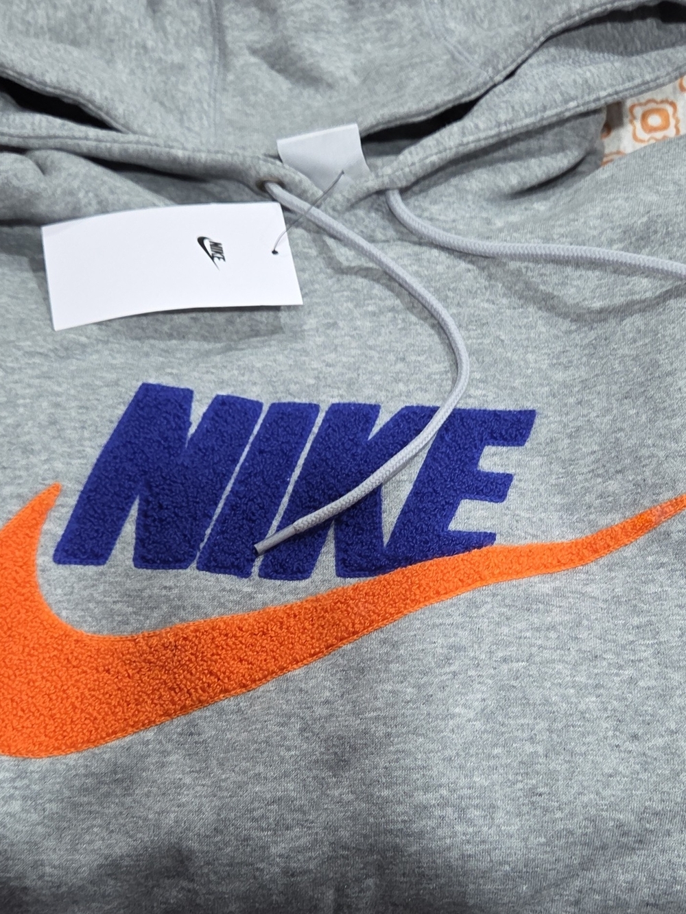 Nike Grey Hoodie with Blue Logo and Orange Swoosh